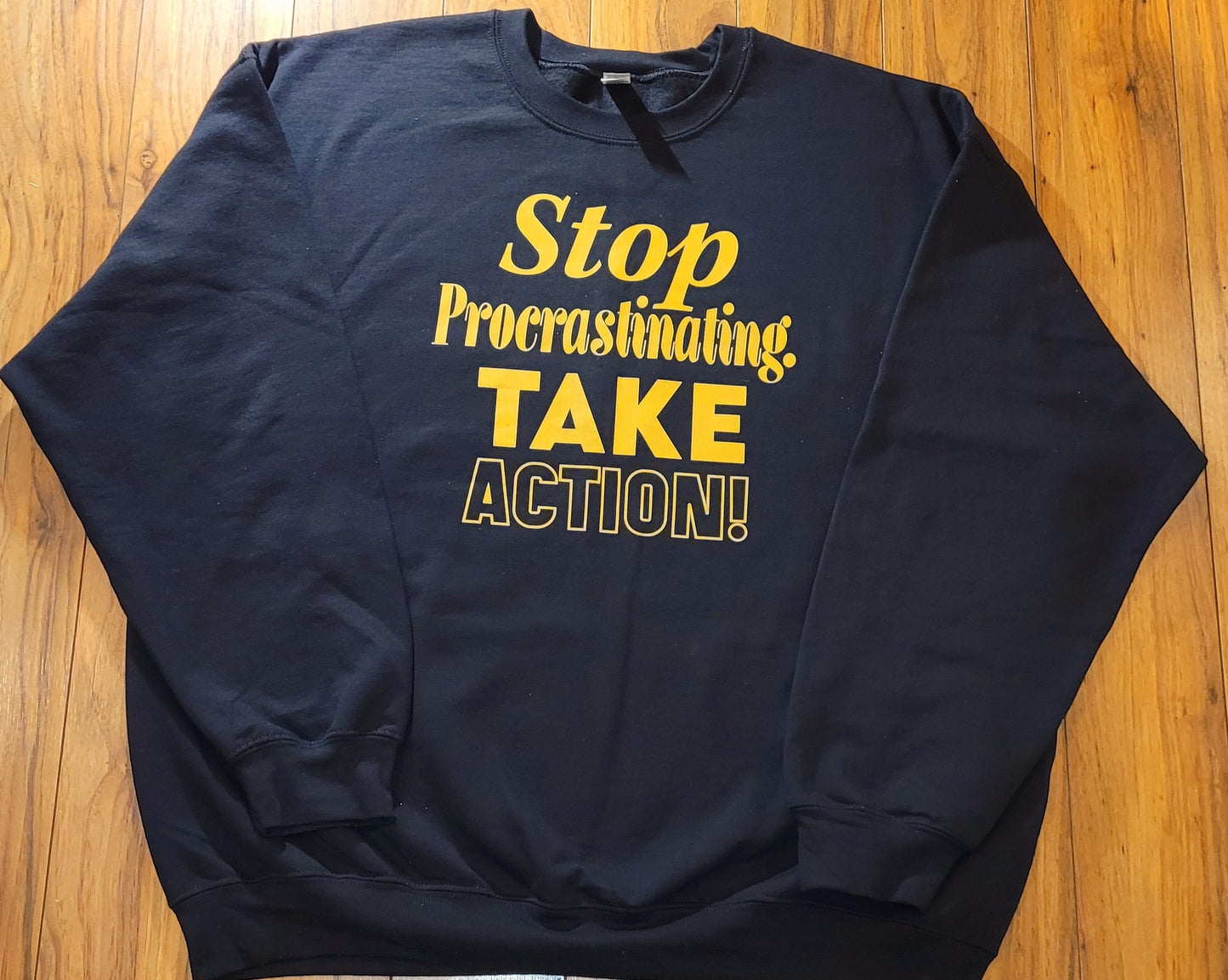 Stop Procrastinating Take Action (sweatshirt) gold letters